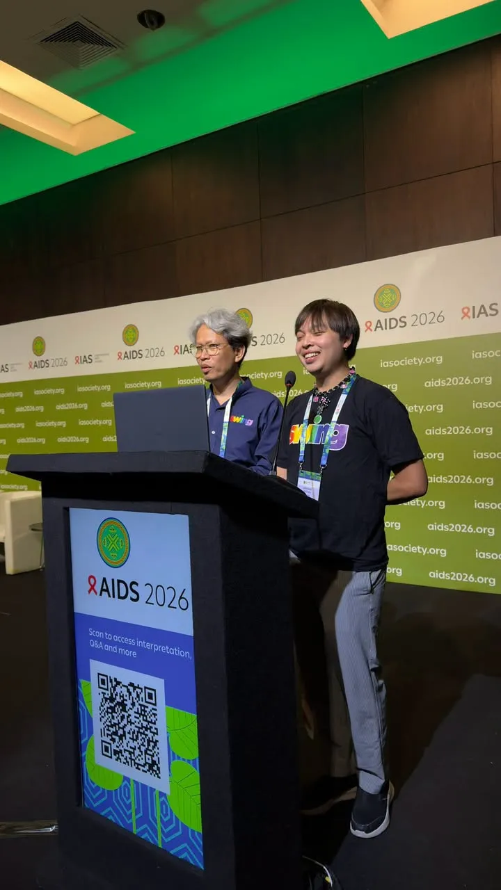 Arm speaking from the stage at AIDS 2026 in Rio de Janeiro