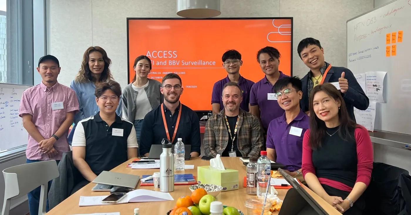 Australia Awards fellows around a workshop table